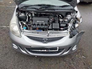 a car engine in a silver car